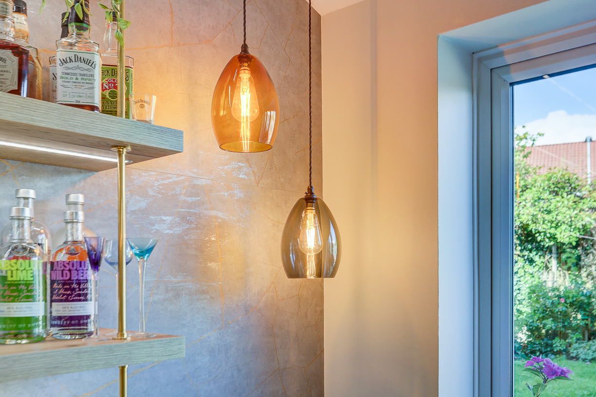 Handleless Kitchen with Banquette Seating Handleless Kitchen with Banquette Seating