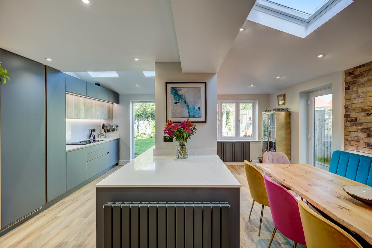 Handleless Kitchen with Banquette Seating Handleless Kitchen with Banquette Seating