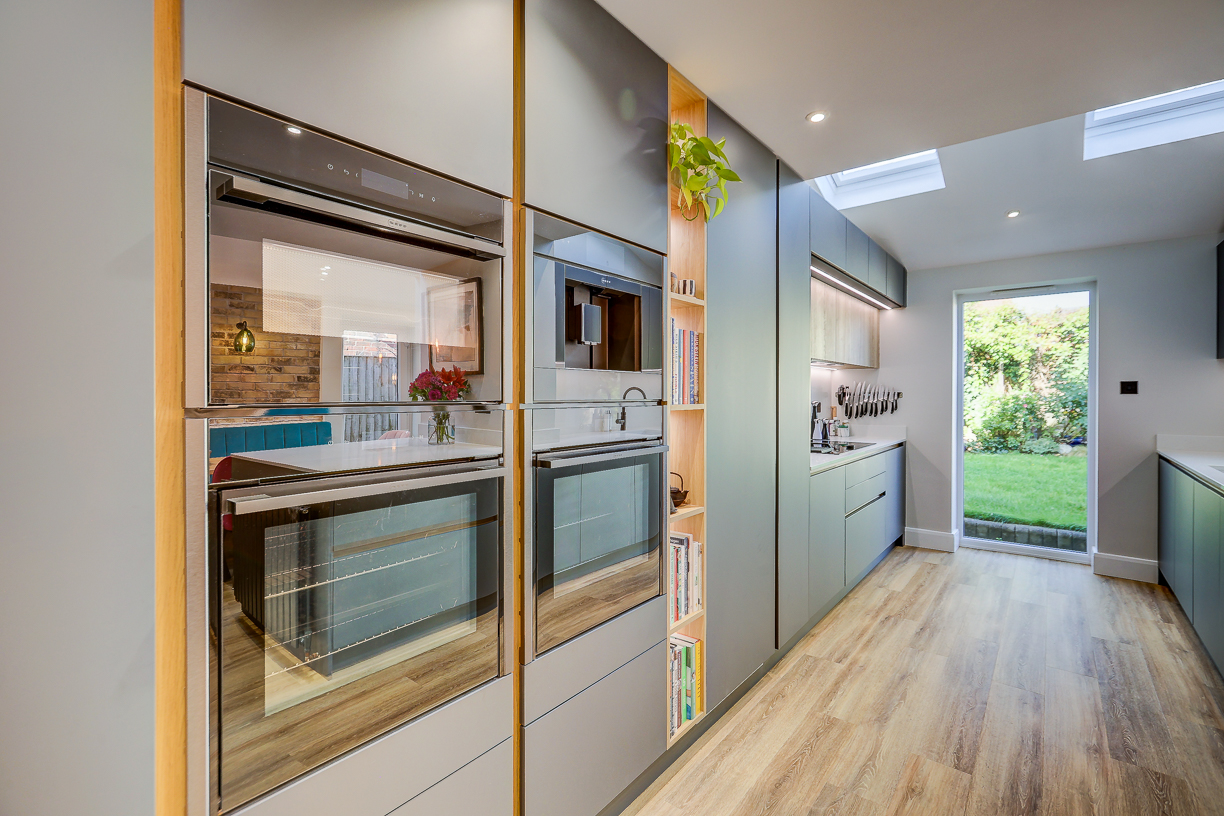 Handleless Kitchen with Banquette Seating Handleless Kitchen with Banquette Seating